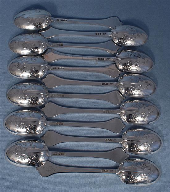 A George V silver canteen of 17th century style lace back trefid pattern cutlery, 110oz/ 3430 grams.